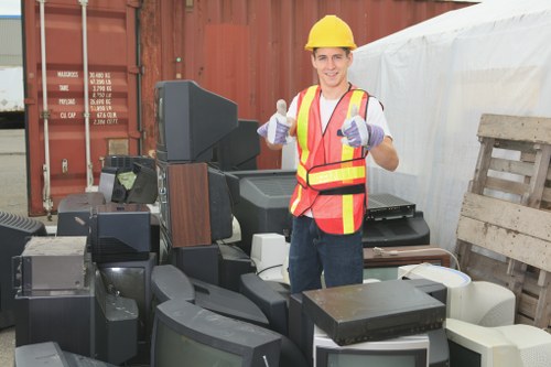 Team at Anerley Skip Hire assisting a customer