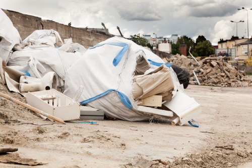 Construction site with waste being removed in Anerley