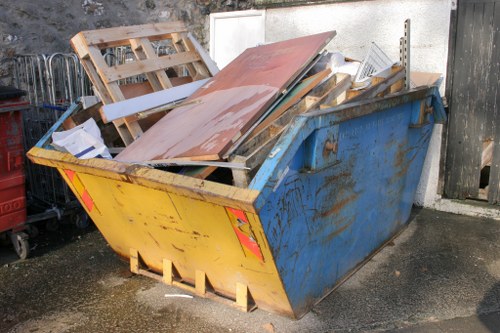 Muck away service team removing construction debris in Anerley