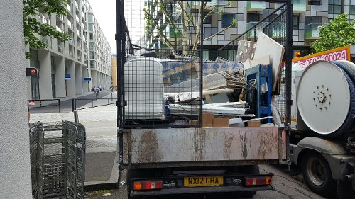 Customer service representative assisting with skip hire inquiries